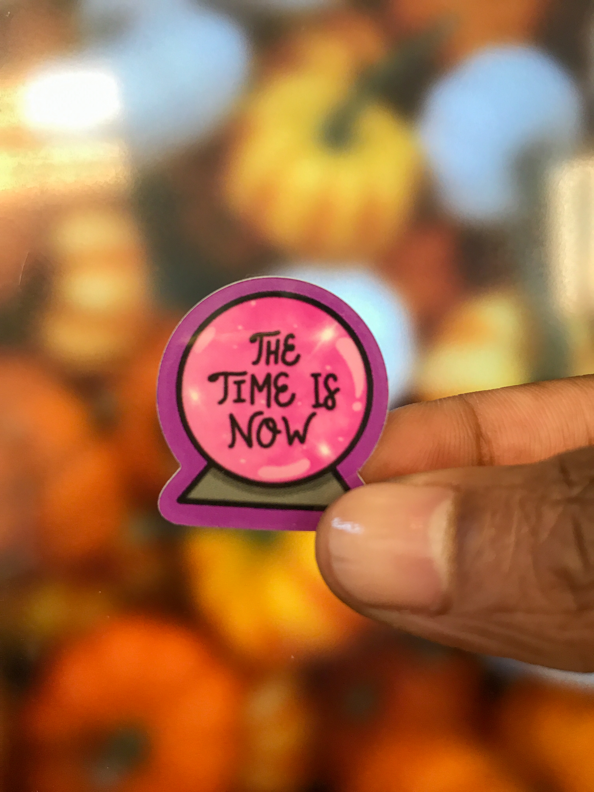 Crystal Ball sticker that reads "The Time Is Now"